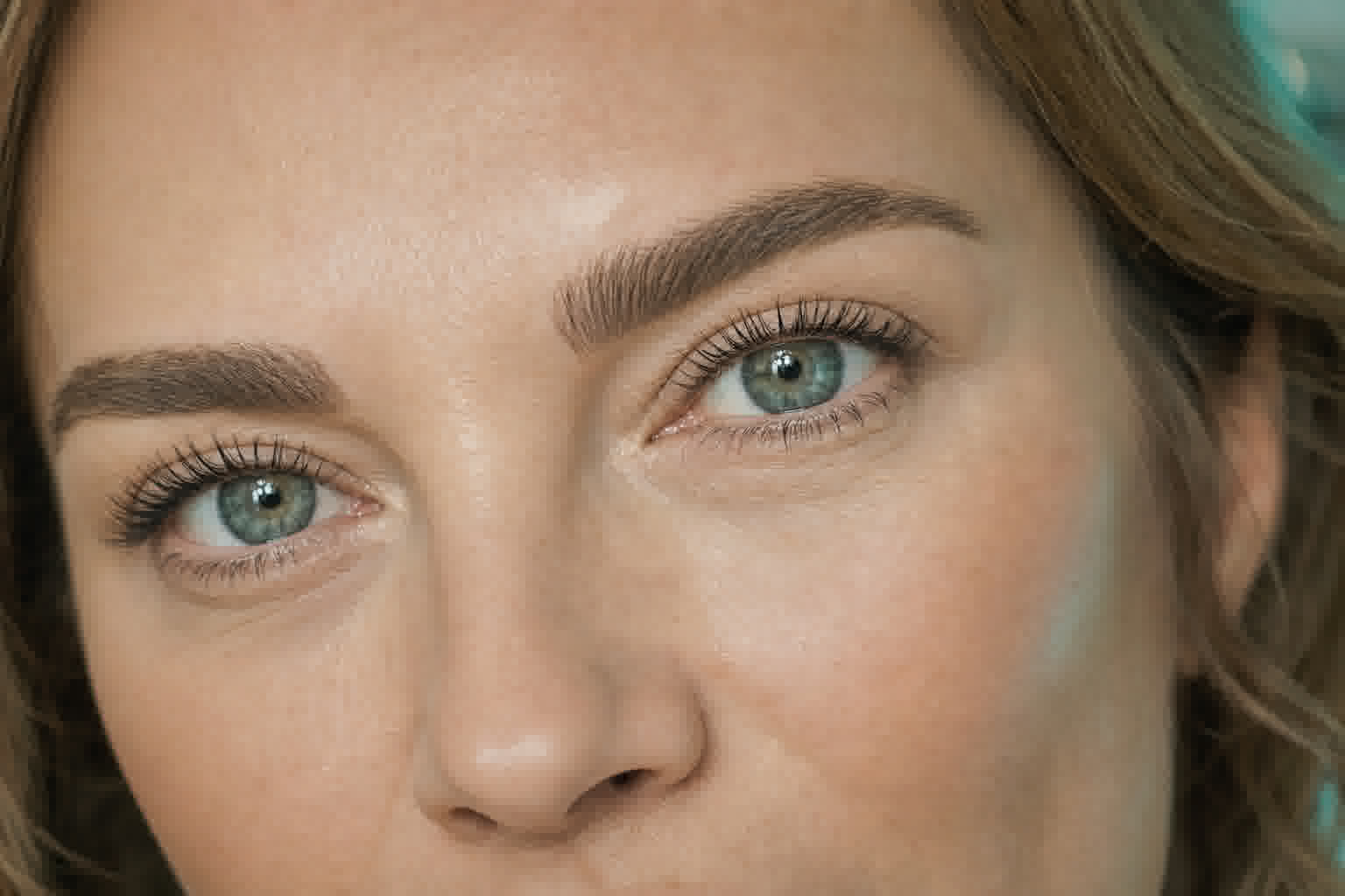 Refined beauty essentials arranged in a calm, premium treatment setting